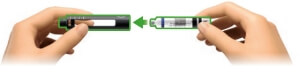 Image of a one hand holding a cartridge holder and other hand pushing a new cartridge into the holder with metal cap first